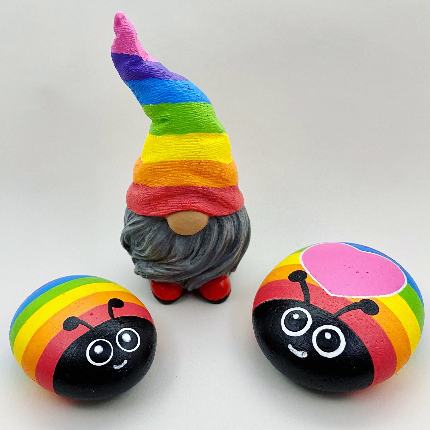 Hand painted Rainbow Gonk and 2 Rainbow Bug Pebbles