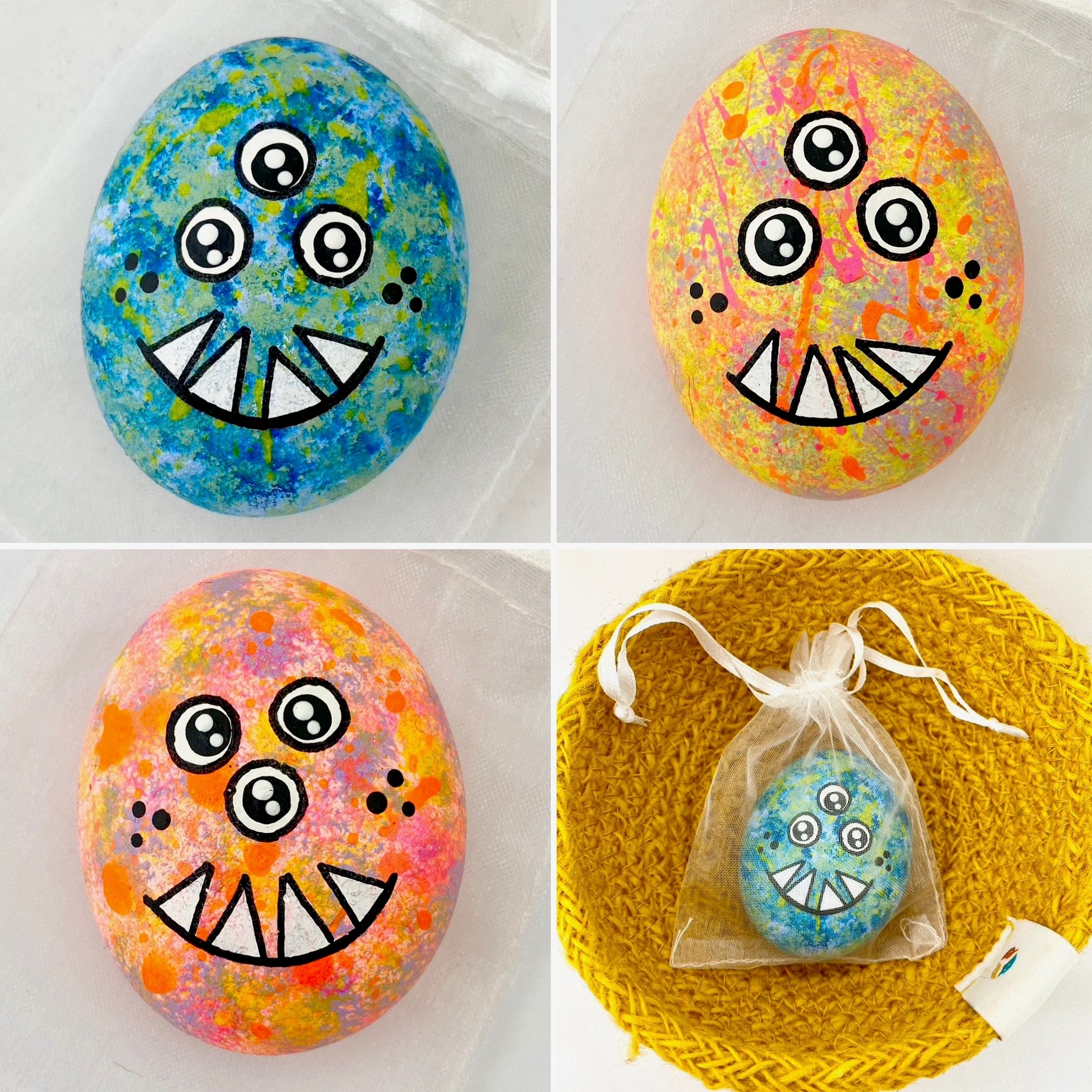 Hand painted 3 eyed monster pebbles called Plarp in 4 different colour ways