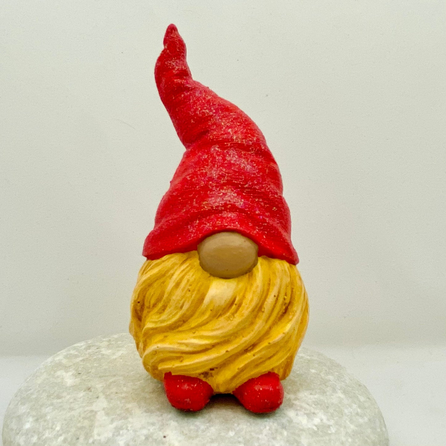 Hand painted Gonk statue with blonde beard and red hat