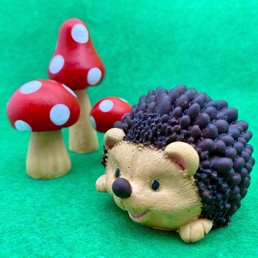 Hand painted Hedgehog and 3 red and white toadstools ornaments