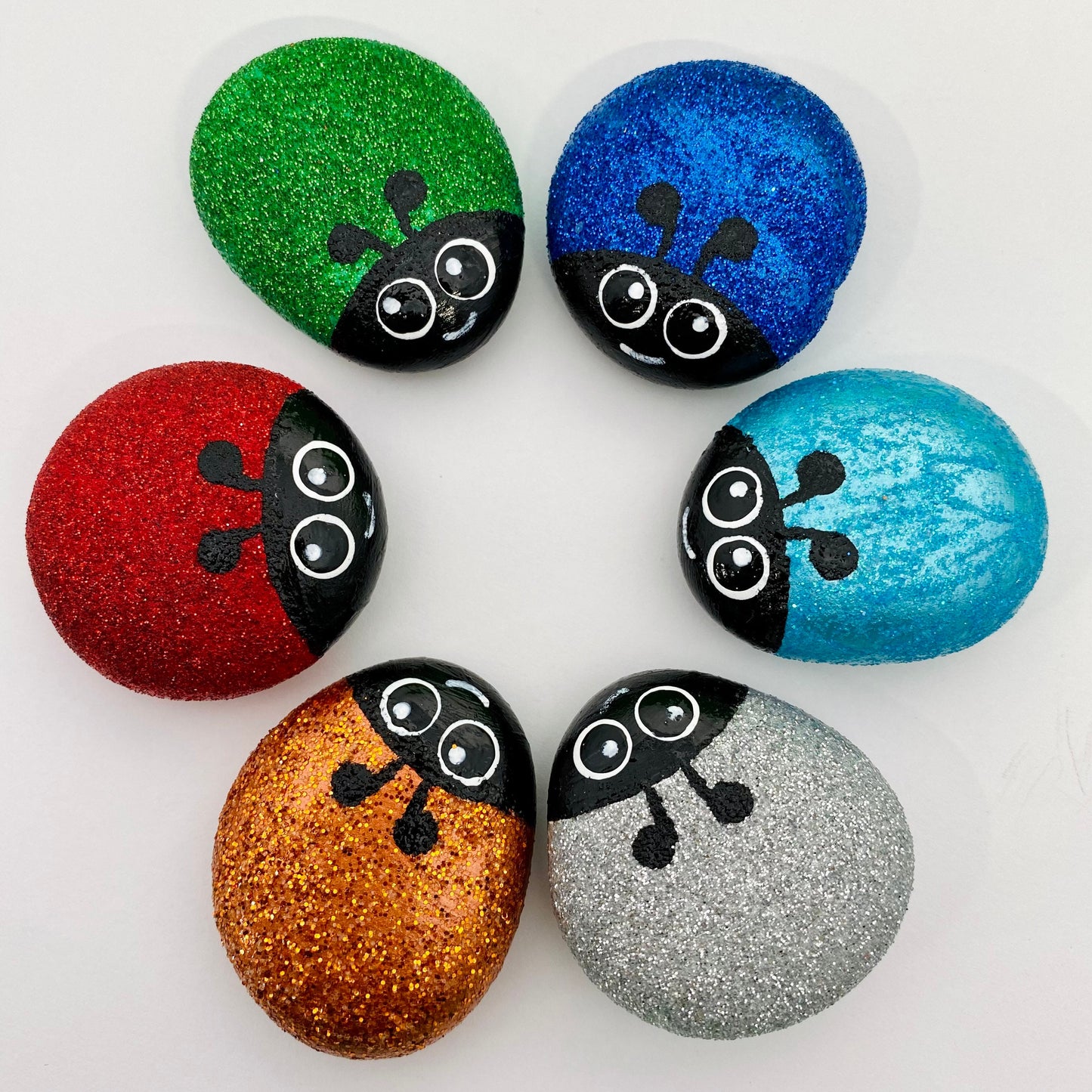 Hand painted Glitter Bug Pebbles in Red, Green, Blue, Dark Blue, Silver and Gold