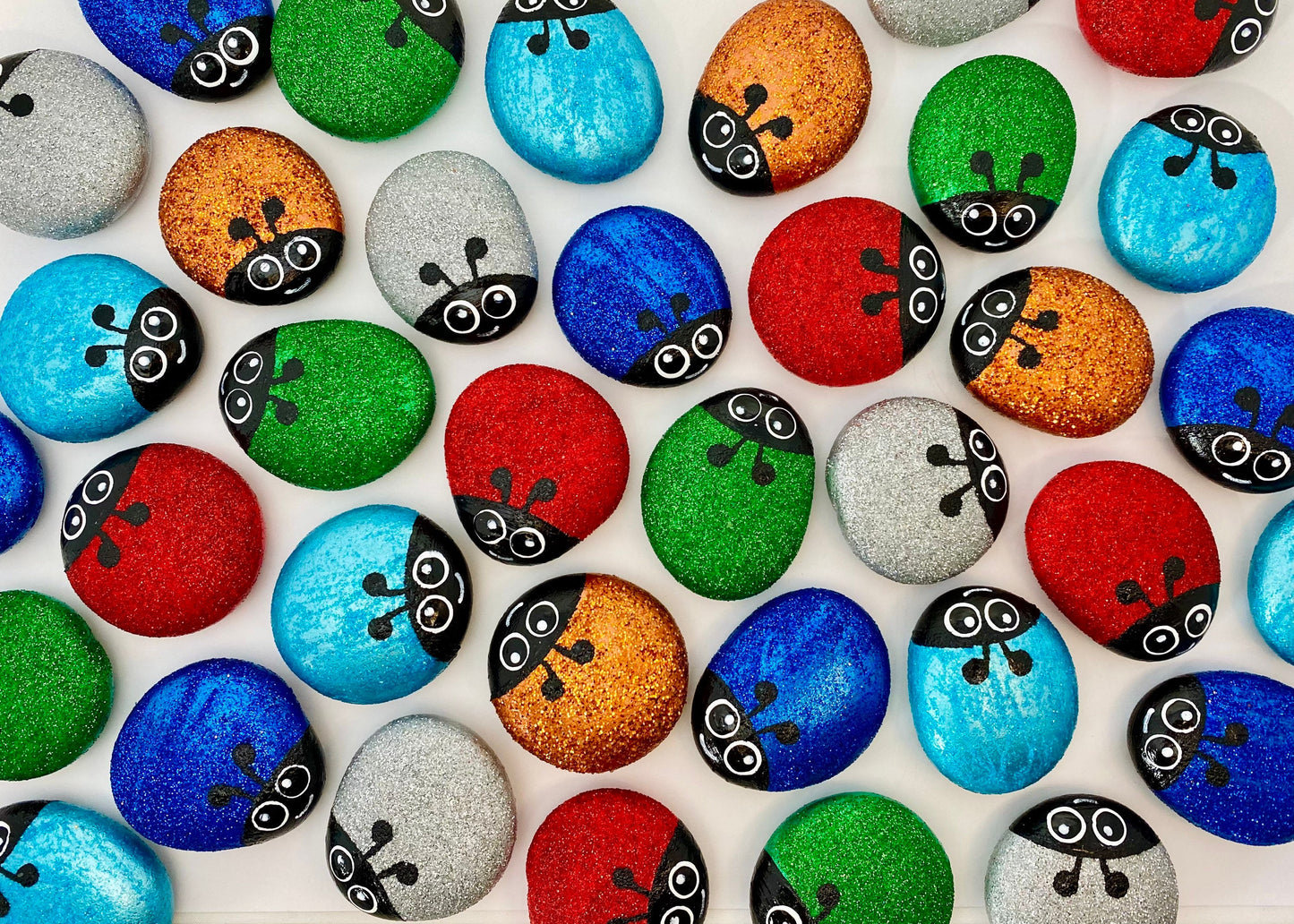 Lots of Hand painted Glitter Bug Pebbles in Red, Green, Blue, Dark Blue, Silver and Gold