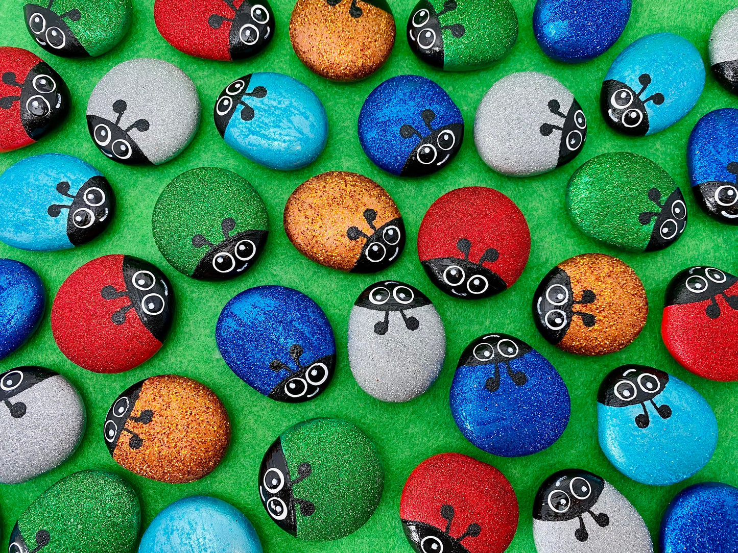 Lots of Hand painted Glitter Bug Pebbles in Red, Green, Blue, Dark Blue, Silver and Gold