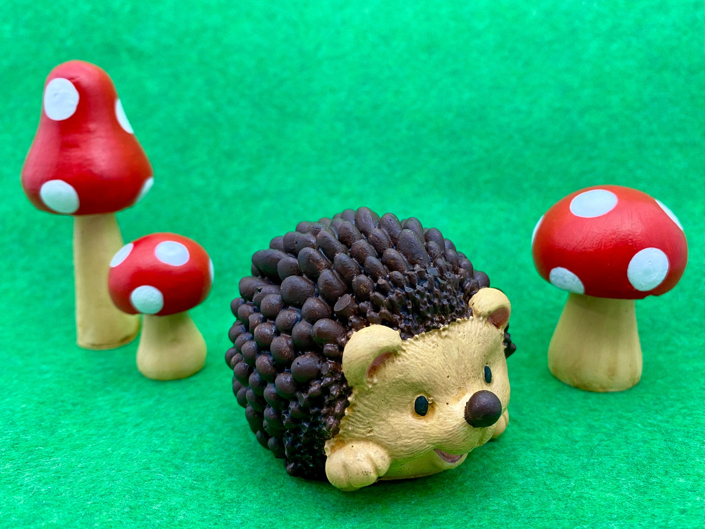 Hand painted Hedgehog and 3 red and white toadstools ornaments